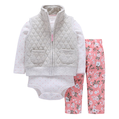 Detalle body blanco con lunares rosas y encaje en puño