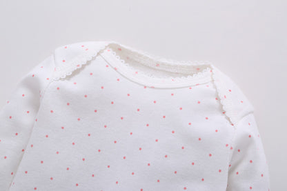 Detalle pantaloncito rosa floral - vista manga/tobillo