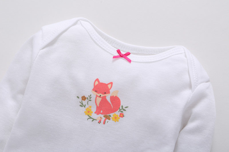 Detalle blusa floral multicolor con puño elástico