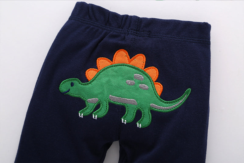 Detalle snap body manga corta dinosaurios