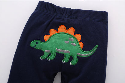 Detalle snap body manga corta dinosaurios