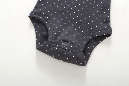 Detalle snap body gris lunares